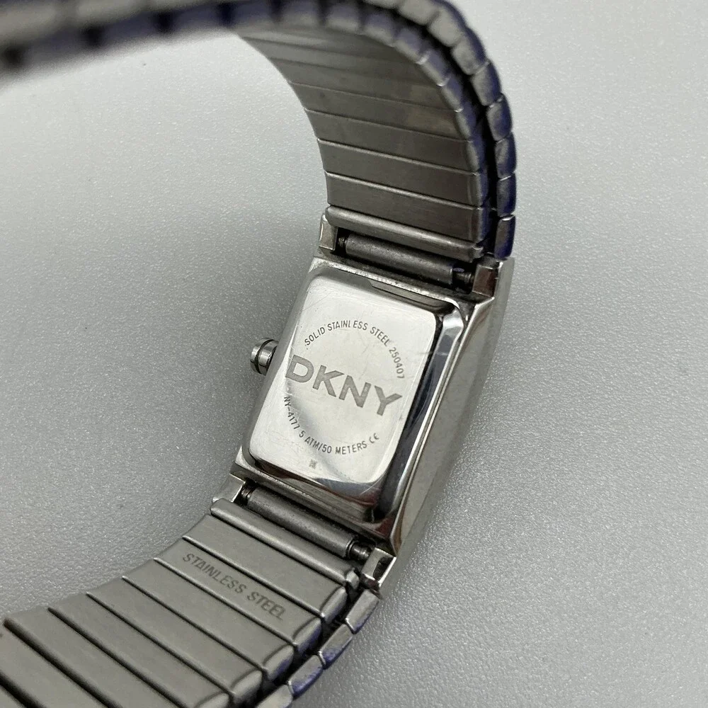 DKNY Womens Watch 19mm Silver Tone Multicolor Dial Blue Stretch Band New Battery